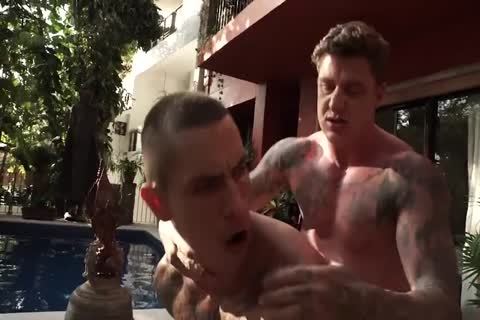 White Tatted man bonks Latino