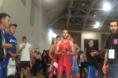 Middle Eastern teens Weigh-in previous to Wrestling Tournament