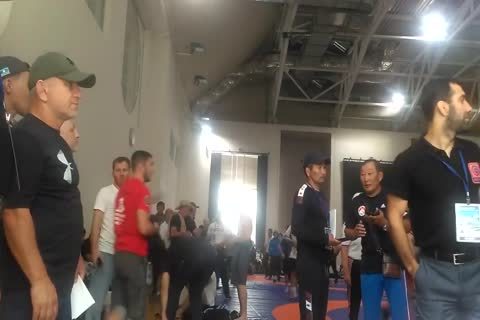 Middle Eastern teens Weigh-in previous to Wrestling Tournament