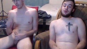 Two males Jerking And Cumming Onto The Glass Desk