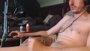 Skinny twink Masturbates Listening To Music