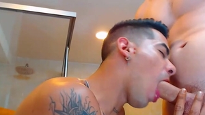 gay couple engulfing