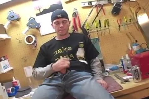 horny lad masturbates by his tools